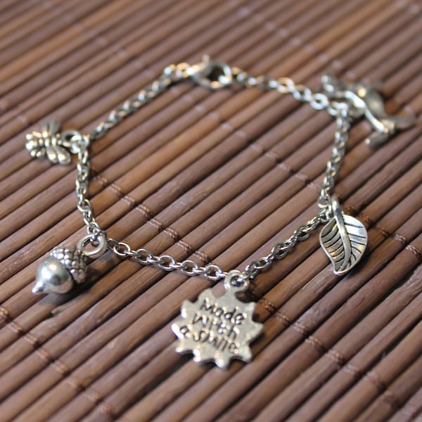 Charm bracelet with five charms
