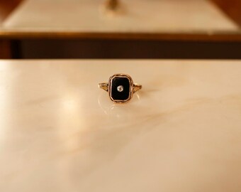 Vintage Art Deco ring met onyx en diamanten | 9 karaat geelgoud