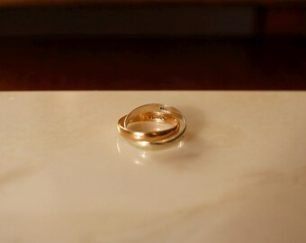 Vintage tweekleurige, in elkaar verstrengelde dubbele gouden ring