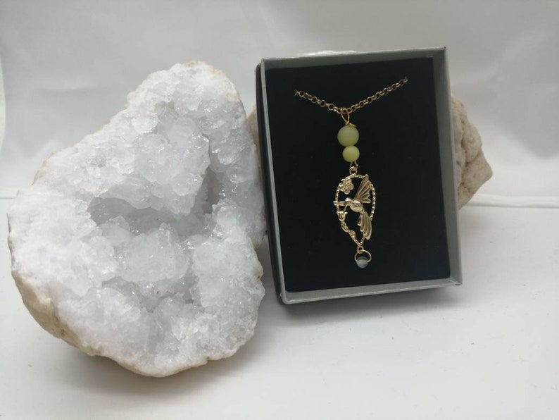 Magic Elf peripedot and white moonstone Earring available from 60 euros! gold-plated chain and gift box offered