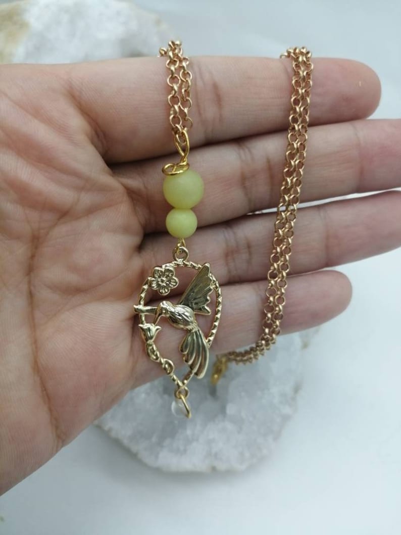 Magic Elf peripedot and white moonstone Earring available from 60 euros! gold-plated chain and gift box offered