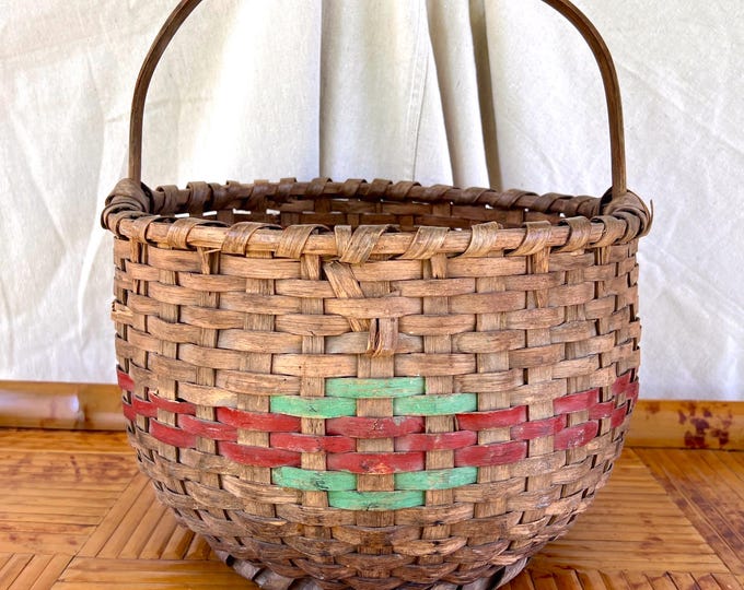 A Large Woven Splint Gathering Basket with Original Red and Green Paint