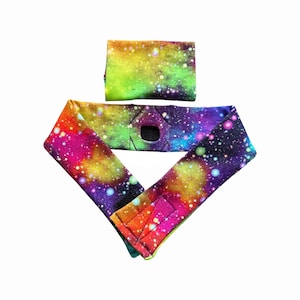 May include: A set of three ceramic canisters with lids, featuring a geometric pattern in shades of blue, white, and grey. The canisters vary in size, with the largest approximately 20 cm tall.