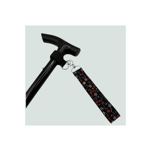 Correa de muñeca para bastón con diseño floral: accesorio para bastón de ayuda a la movilidad de Reds Cotton.