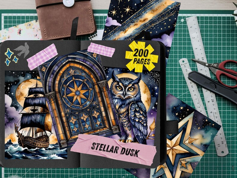 May include: A black journal with a watercolor illustration of a ship, owl, and celestial elements. The journal has 200 pages and is decorated with washi tape. The words "Stellar Dusk" are visible.