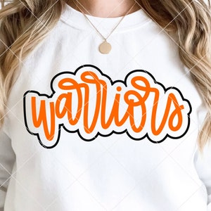 May include: White sweatshirt with the word "warriors" in orange script, outlined in black and white. The sweatshirt is plain, with long sleeves. The bottom of the image shows the text "The Blank Pineapple" and the file types SVG, PNG, and DXF.