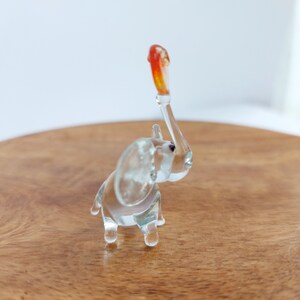 Miniature Murano Glass Elephant Holding Heart: Handmade Figurine