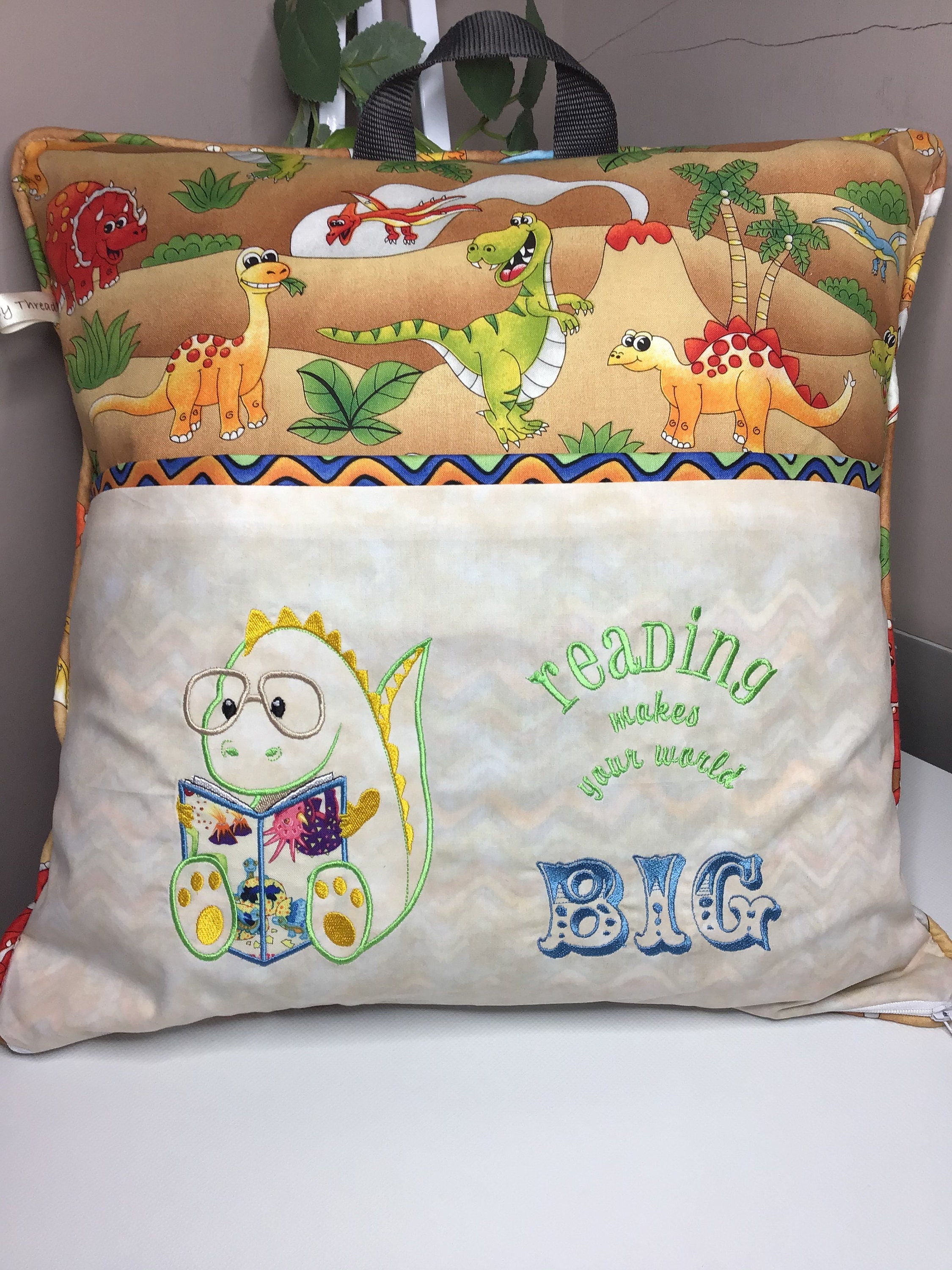dinosaur reading pillow
