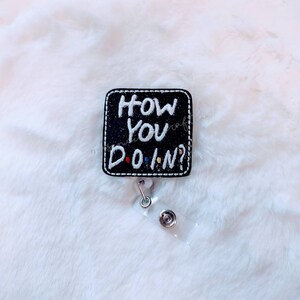 How You D•O•I•N? - Glitter Vinyl Badge Reel