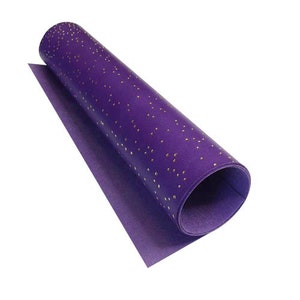 May include: A roll of purple paper with gold glitter embedded in the surface. The paper is rolled up and the end is visible.