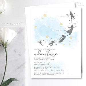 May include: A blue and white baby shower invitation with a watercolor background and silhouettes of Peter Pan and the Lost Boys flying. The text reads "To live will be an awfully big adventure. A baby shower honoring Celeste. Join us in Neverland. Sunday, May 23, 2021, 3:00-5:00 PM, 1234 14th St | Oakland CA. RSVP | Megan 123.456.7890. Registry | Target & Amazon."