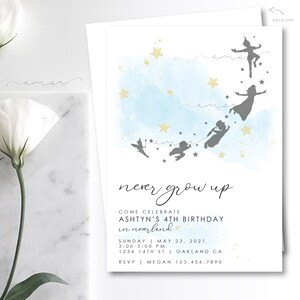 May include: A blue and white watercolor background with gold stars and silhouettes of Peter Pan and the Lost Boys flying. The text "never grow up" is written in black script. The text "Come Celebrate Ashtyn's 4th Birthday in Neverland" is written in black. The date, time, and location of the party are listed below.
