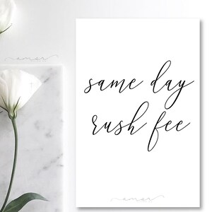 May include: A white background with black calligraphy text that reads "same day rush fee".