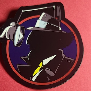 May include: A black and white silhouette of a detective wearing a fedora and trench coat, holding a magnifying glass. The silhouette is set against a dark blue background with a red border.