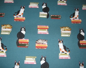 Flannel fabric Cats Standing On Books, green flannel, 100% cotton. New, not washed.  Sold by the yard, 42 inches wide.