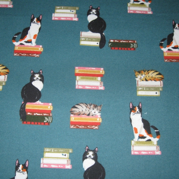 Flannel fabric Cats Standing On Books, green flannel, 100% cotton. New, not washed.  Sold by the yard, 42 inches wide.