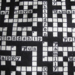 Flannel fabric crossword puzzle, love, friendship. Valentines.100% cotton sold by the yard, 42 inches wide. New not washed.  Two cuts.