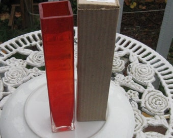 Vase, red, 1 1/2-inch square glass flower vase with box.  Nine inches tall.   Clear base.  New.  Not used.  Mother's Day.