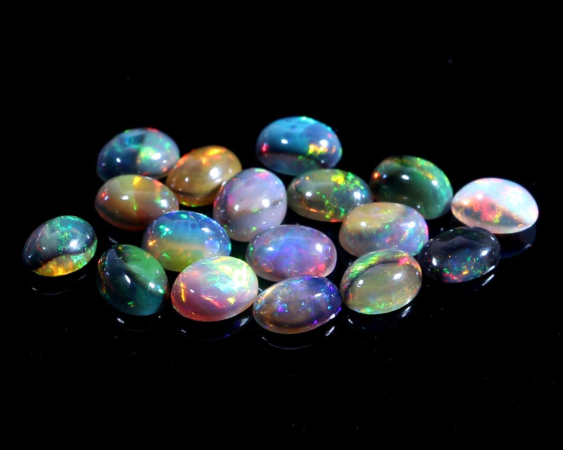 Loose Gemstone C7966 100/% Natural Ethiopian Black Dyed Fire Opal 6x8 mm Oval Cabochon 17 Pcs Lot 14.70 Cts