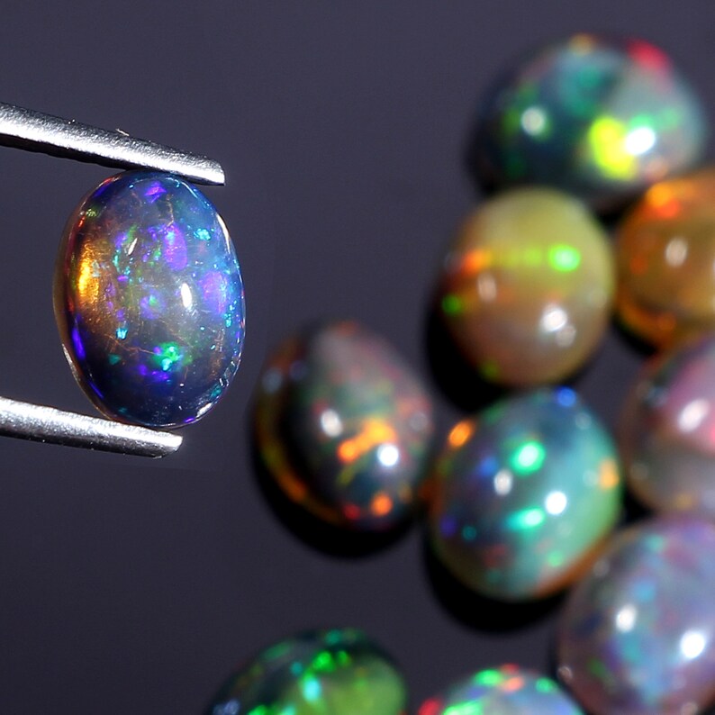 Loose Gemstone C7966 100/% Natural Ethiopian Black Dyed Fire Opal 6x8 mm Oval Cabochon 17 Pcs Lot 14.70 Cts