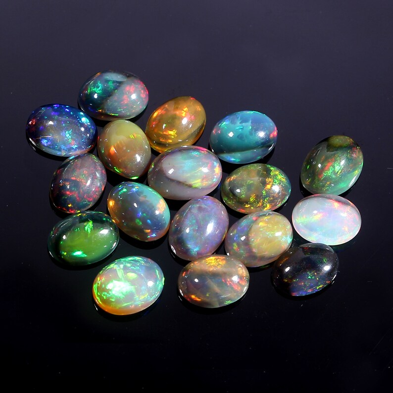 Loose Gemstone C7966 100/% Natural Ethiopian Black Dyed Fire Opal 6x8 mm Oval Cabochon 17 Pcs Lot 14.70 Cts