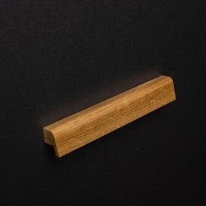 Wooden cabinet handles made of oak and ash. model 11