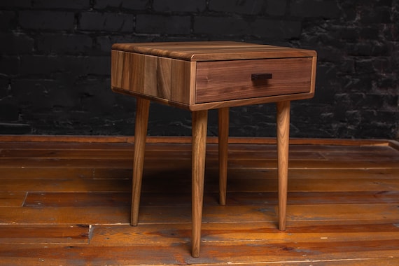 Mid-Century walnut nightstand. Wooden bedside table