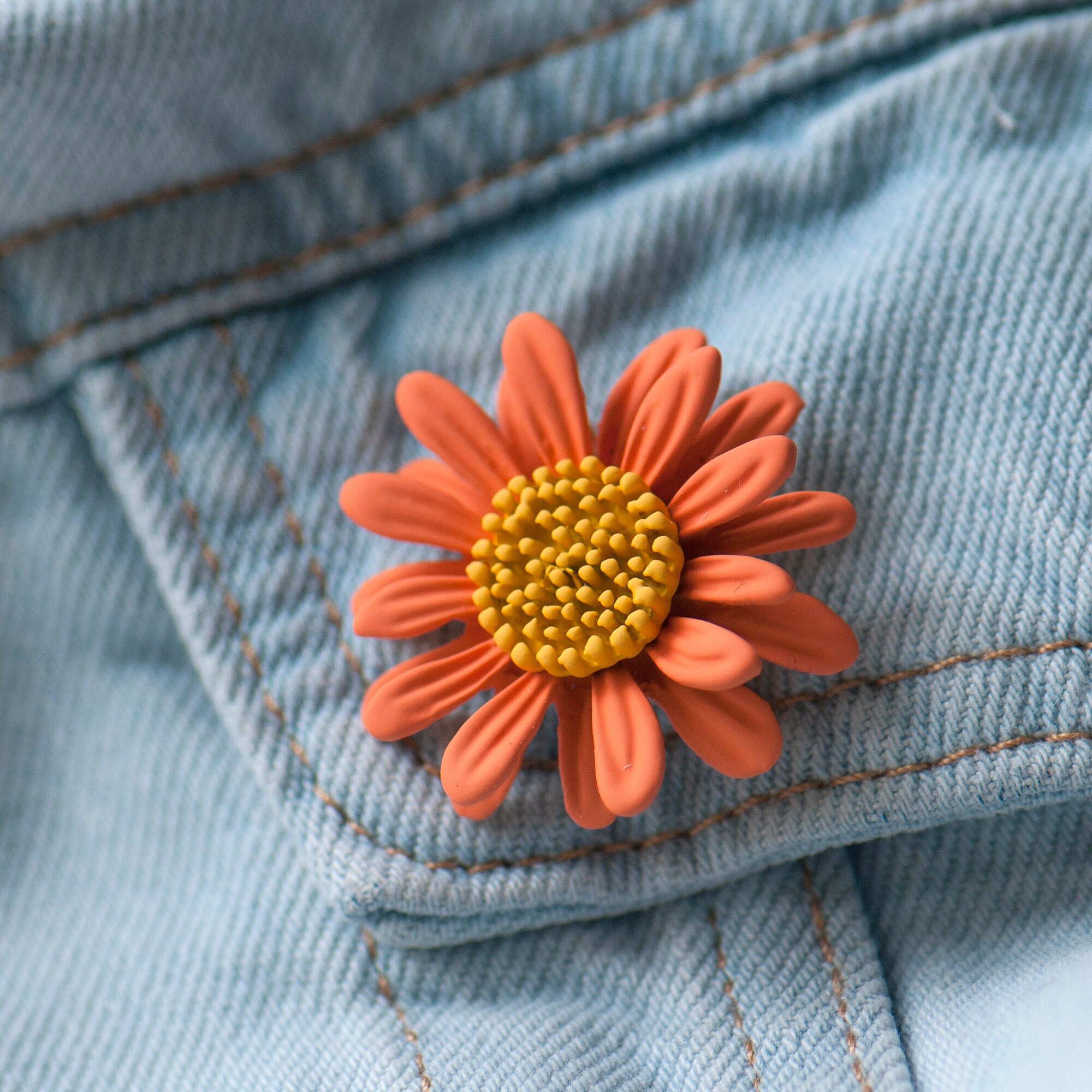 Orange brooch sale