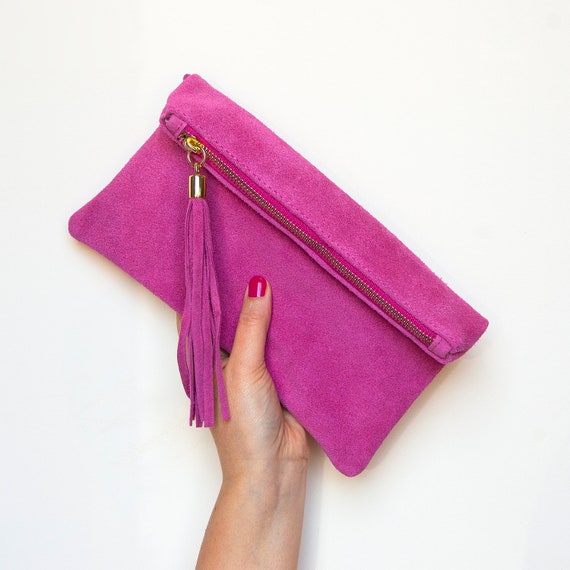 pink suede clutch bag