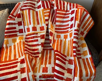 Quilt - Orange, Red, and  Coral on White Circuitry Pattern