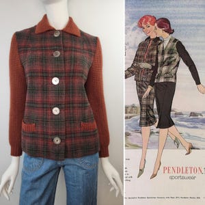 May include: A button-up jacket featuring a red and green plaid pattern on the front and back panels, with solid rust-colored knit sleeves, a matching knit collar, and two front pockets. The jacket is displayed on a mannequin with blue jeans.