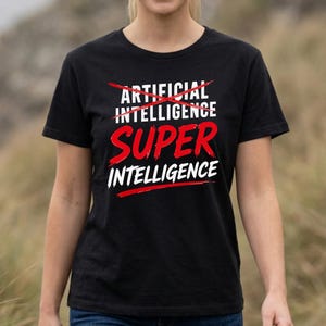May include: A black short-sleeved t-shirt featuring the white text ARTIFICIAL INTELLIGENCE with a red line crossed through it, followed by the word SUPER in large red letters and the word INTELLIGENCE in white letters below it.