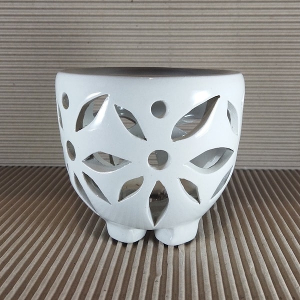 Ceramic pot for orchids. White glazed with legs.