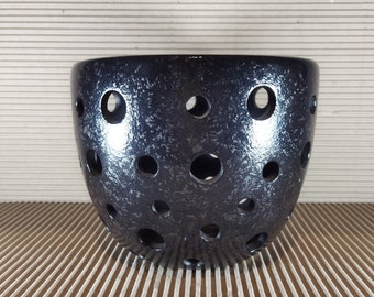 Ceramic pot for orchids in round holes. Black glaze. No glaze inside.