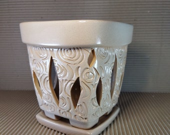 Ceramic pot for orchids, square shape, covered with a pattern and painted glaze. Set of two. Pot and saucer. Square pot with legs.