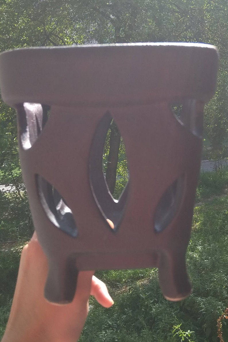 The surface imitates the bark of a tree Orchid pot On the legs Square shape Brown black. Big