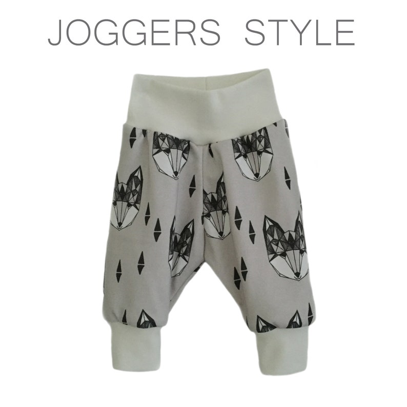 May include: Gray joggers with a white waistband and black geometric fox print. "JOGGERS STYLE" is written in white text at the top of the image.