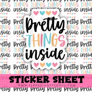 May include: Sticker sheet with a repeating pattern of the phrase "Pretty Things Inside" in black text with pink, blue, and orange hearts. The phrase is surrounded by a white border and a pink, blue, and orange heart pattern.