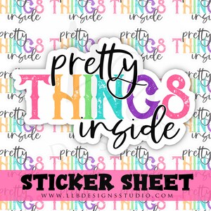 May include: A sticker sheet featuring a design with the words "pretty things inside" in a colorful, distressed font. The sticker sheet has a pink banner at the bottom with the words "STICKER SHEET" in black.