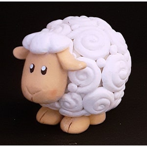 Cute clay sheep figurine