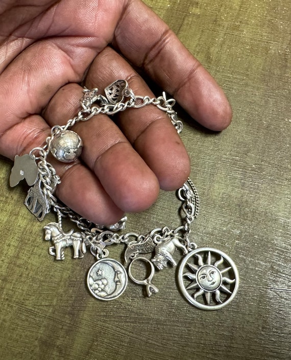 Vintage James Avery charm bracelet with lots of James… Gem