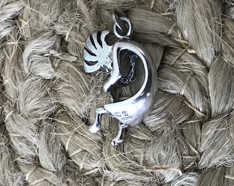 Sterling silver Kokopelli tribal man playing flute pendant.#3035