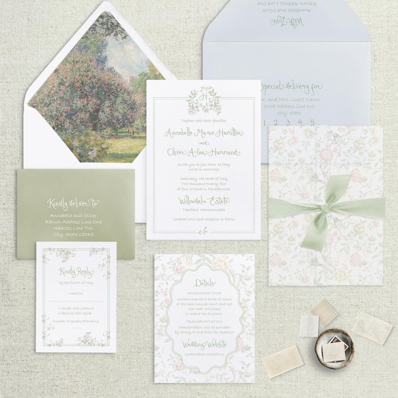 May include: A wedding invitation suite with a floral design. The invitation features a green and white floral pattern with a green ribbon. The invitation text includes the names Annabelle Marie Hamilton and Oliver Alan Hammond, the date Saturday the tenth of May, and the location Willoridake Estate. The RSVP card features a floral border and the text "Kindly Reply". The details card features a floral border and the text "Details".