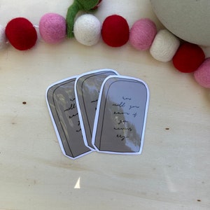 May include: Three gray stone-shaped stickers with the text "how will you know if you never try" written in black cursive.