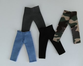 Four pairs of Miniature Dolls Trousers