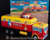 Vintage 1960s Japanese tinplate mechanical animal circus truck with pop up cat