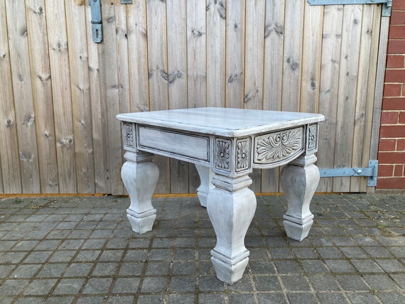 Newly painted and waxed chunky coffee table with deep carving