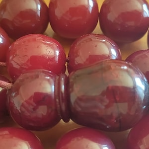 Unique Antique Masterpiece Huge Rare Faturan Amber Beads. Extraorinary Colours and Veins inside Old Hand Made Beads. An optical miracle!