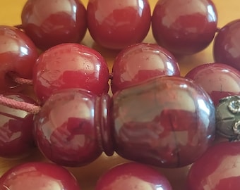 Unique Antique Masterpiece Huge Rare Faturan Amber Beads. Extraorinary Colours and Veins inside Old Hand Made Beads. An optical miracle!