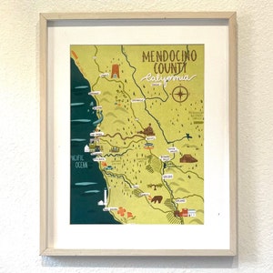 May include: A colorful illustrated map of Mendocino County, California. The map features a compass, a train, a bear, and the words "Mendocino County California".
